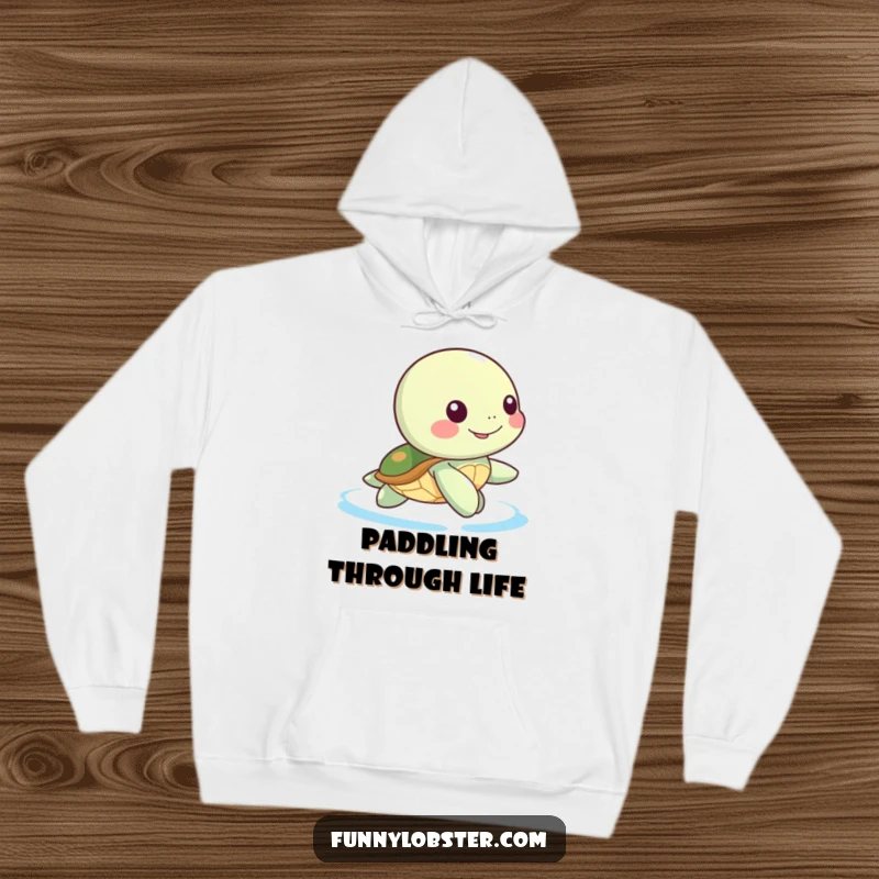 Funny Kawaii sea turtle paddling happily, a soft and humorous hoodie for serene comfort.